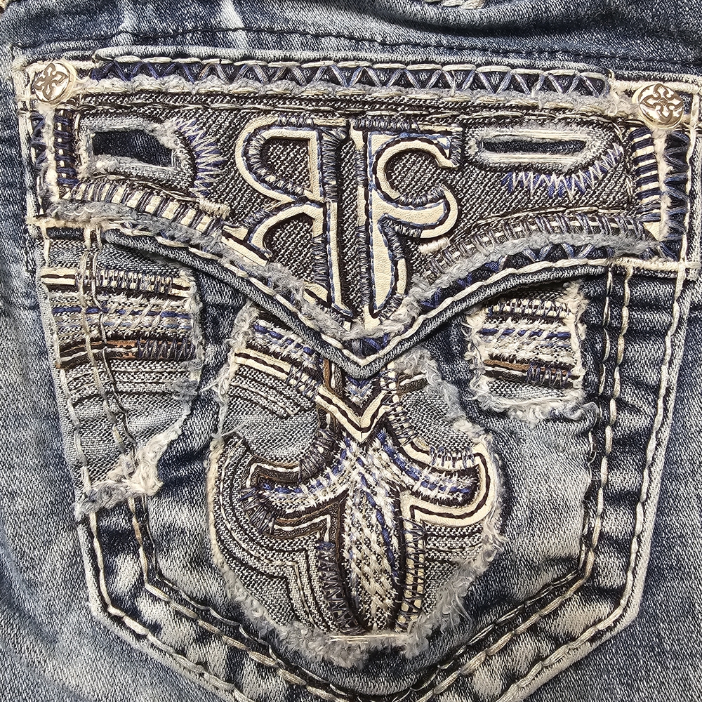 Rock Revival Blue Distressed Embroidered Jeans . Inseam Is 30